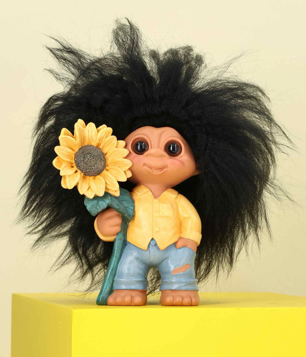 LYKKETROLEN SOLSIKKEN.