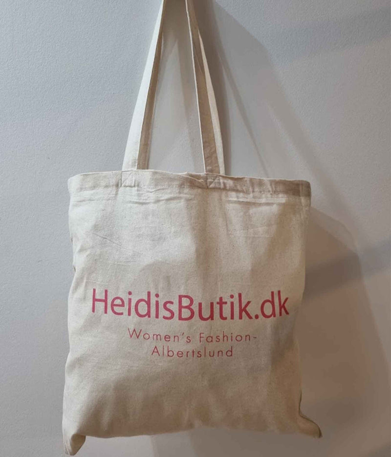 INKØBSNET MED HEIDISBUTIK LOGO PÅ.